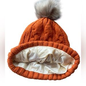 GRACE ELEYAE Satin-Lined Anti-Frizz Cable Knit Slap Beanie w/ Pom – Orange
